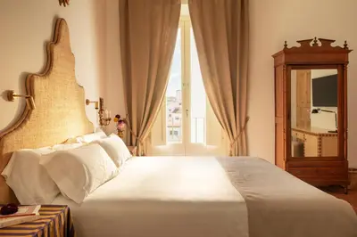 Cama o camas de una habitación en Casa Pizarro Hotel
