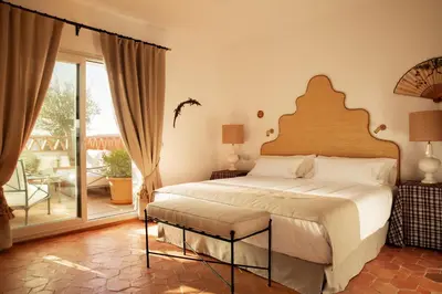 Cama o camas de una habitación en Casa Pizarro Hotel