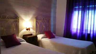 Cama o camas de una habitación en Casa Rural San Blas