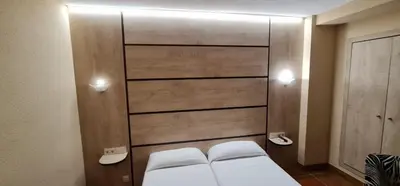 Cama o camas de una habitación en Hotel La Rad