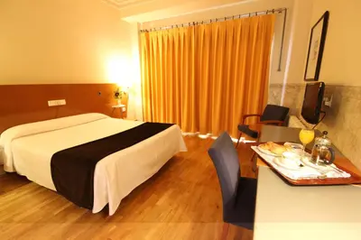 Cama o camas de una habitación en Hotel Azar