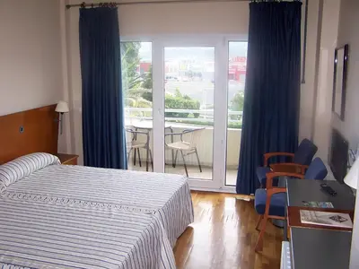 Cama o camas de una habitación en Hotel Azar