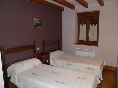 Cama o camas de una habitación en Mirasierra II Y III