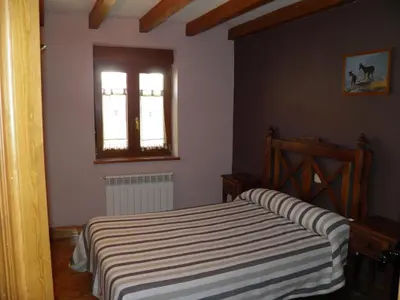 Cama o camas de una habitación en Mirasierra II Y III