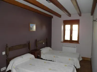 Cama o camas de una habitación en Mirasierra II Y III