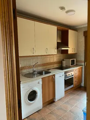 Una cocina o zona de cocina en Mirasierra II Y III