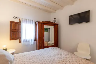 Cama o camas de una habitación en Natural&Mente El Tomillar