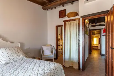 Cama o camas de una habitación en Natural&Mente El Tomillar