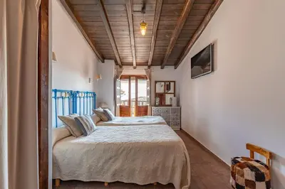 Cama o camas de una habitación en Natural&Mente El Tomillar