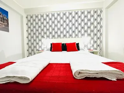 Cama o camas de una habitación en Imperium Apartamentos Centro Parking Gratis