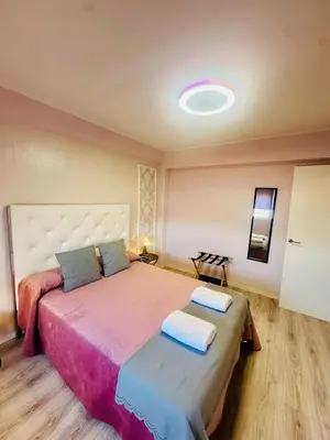 Cama o camas de una habitación en Imperium Apartamentos Centro Parking Gratis