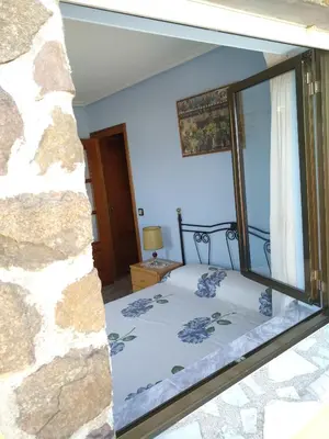 Cama o camas de una habitación en Casa Rural El Carrascal