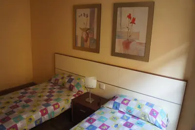 Cama o camas de una habitación en Monumental Apartments Salamanca