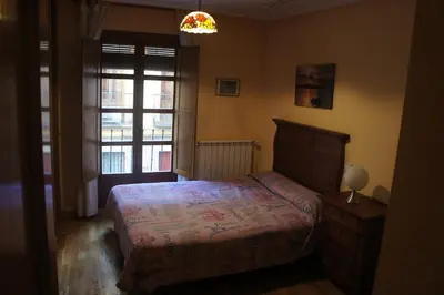 Cama o camas de una habitación en Monumental Apartments Salamanca