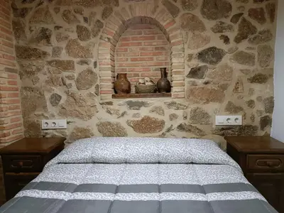 Cama o camas de una habitación en Apartamento o Casa Rural Roquemar
