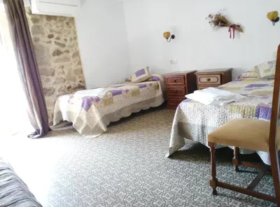 Cama o camas de una habitación en Apartamento o Casa Rural Roquemar
