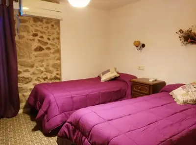 Cama o camas de una habitación en Apartamento o Casa Rural Roquemar