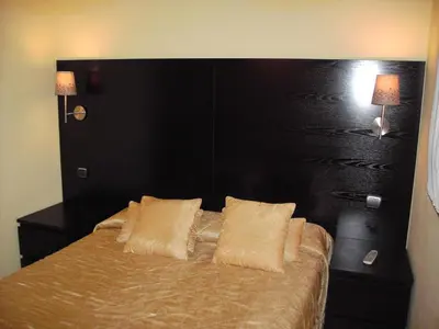 Cama o camas de una habitación en Hotel Rural El Yantar de Gredos