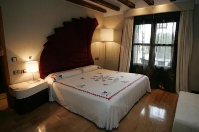 Cama o camas de una habitación en Hotel Termal Abadia de Los Templarios