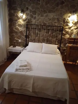 Cama o camas de una habitación en Casa Rural Canchalejo