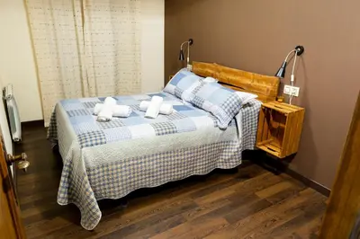 Cama o camas de una habitación en El Rencuentro Casa Rural de Gredos