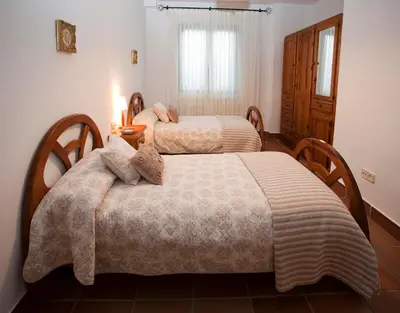 Cama o camas de una habitación en Casa Rural El Secreto de las Eras