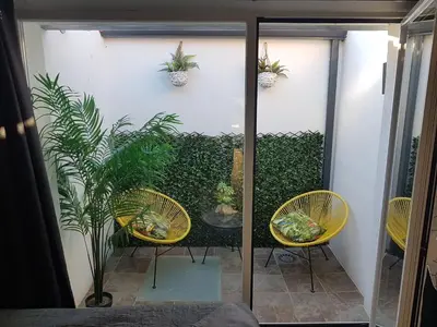 Zona de estar de Suite del Pecado