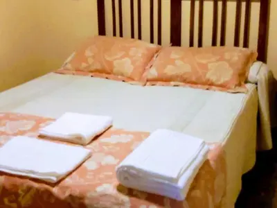 Cama o camas de una habitación en Hospedería Tía María