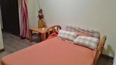 Cama o camas de una habitación en Hospedería Tía María