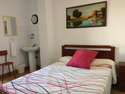 Cama o camas de una habitación en Pension Carretero
