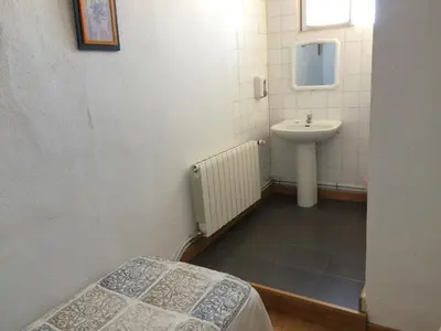Un baño de Pension Carretero