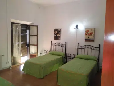 Cama o camas de una habitación en Pension Carretero