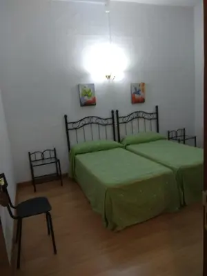 Cama o camas de una habitación en Pension Carretero