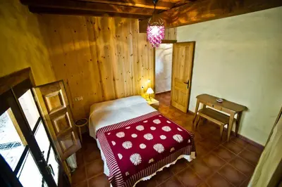 Cama o camas de una habitación en Casa del Herrero