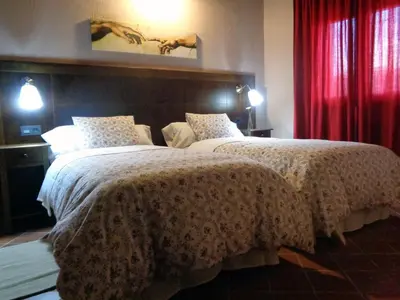Cama o camas de una habitación en La Majada de la Covatilla