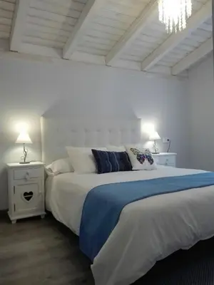 Cama o camas de una habitación en Casas Rurales Prunus Avium