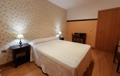Cama o camas de una habitación en Casa Rural La Piedra De Juana