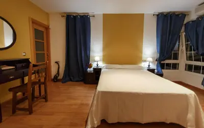 Cama o camas de una habitación en Casa Rural La Piedra De Juana