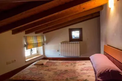 Cama o camas de una habitación en Casa Rural Paco