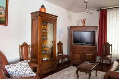 Una televisión o centro de entretenimiento en Casa Rural Paco