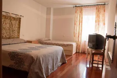 Cama o camas de una habitación en Casa Rural Paco