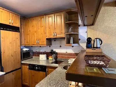 Una cocina o zona de cocina en El Sobrao de Gredos