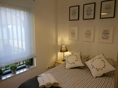 Cama o camas de una habitación en Apartamento espacioso frente al Palacio de Congresos - AA