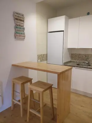 Una cocina o zona de cocina en Apartamento espacioso frente al Palacio de Congresos - AA