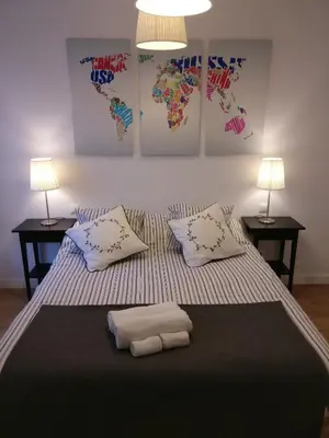 Cama o camas de una habitación en Apartamento espacioso frente al Palacio de Congresos - AA