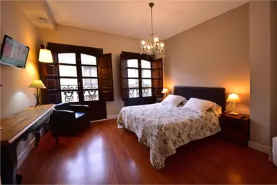 Cama o camas de una habitación en Salamanca Centro Apartamentos