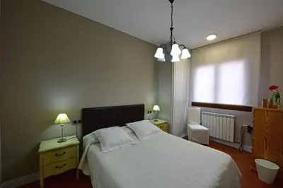 Cama o camas de una habitación en Salamanca Centro Apartamentos