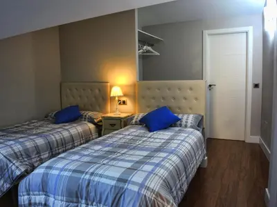 Cama o camas de una habitación en Salamanca Centro Apartamentos
