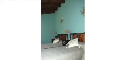 Cama o camas de una habitación en El Capricho de Ana