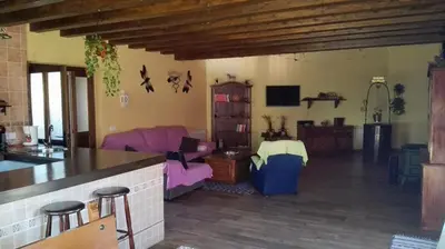 Una televisión o centro de entretenimiento en Casa Rural Rosa Magica